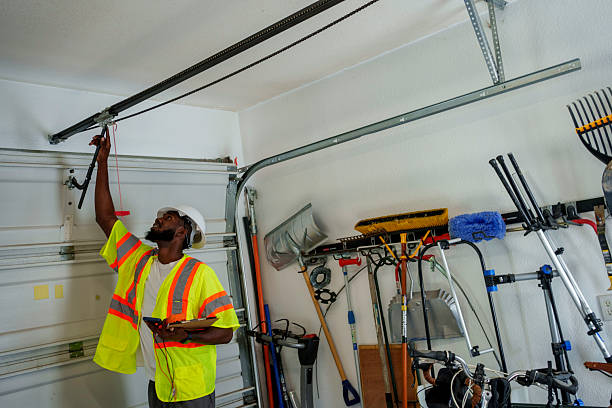 Professional Garage Door Panel Replacement technician working in Larchmont, NY